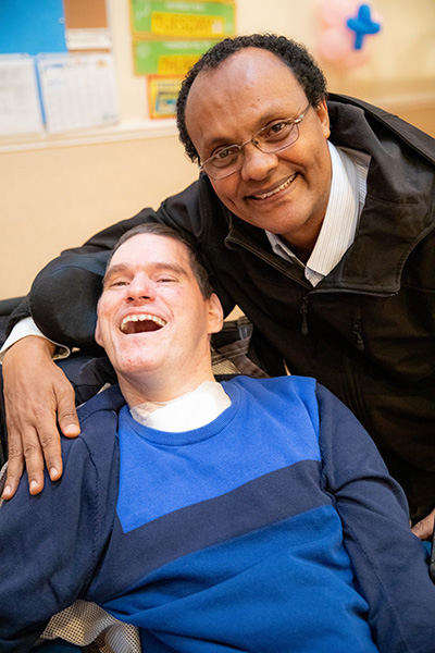 caregiver and client posing for the camera